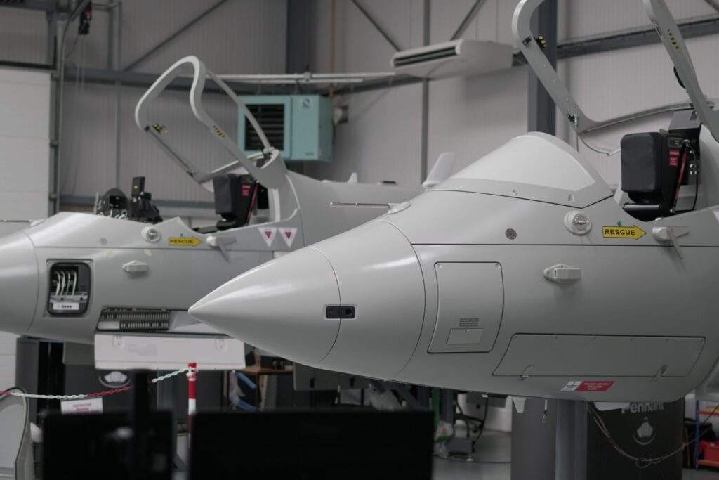 New product video - Integrated Avionics Maintenance Trainer (IAMT) 19 Two replica training frames in a warehouse