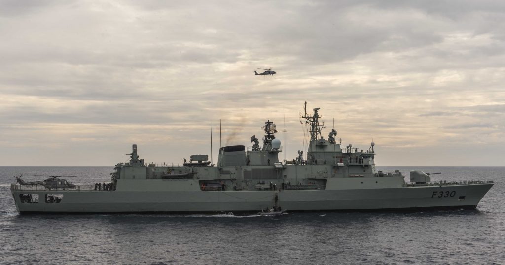 Pennant Software Services Announcement 14 An image of a helicopter in a cloudy sky and a ship in the ocean