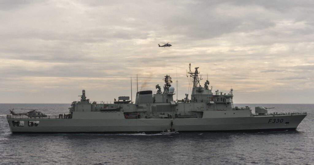 Pennant Software Services Announcement 5 An image of a helicopter in a cloudy sky and a ship in the ocean