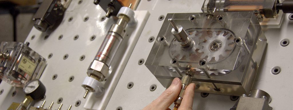 A metal training equipment with cogs on