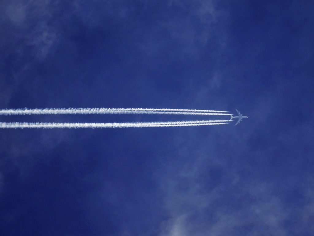 The Advantages of Working with a Customer’s S1000D BREX 5 A stock image of a blue sky with a plane flying through it