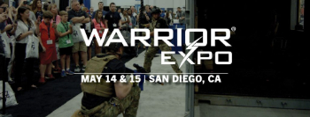 An image of a show showing a crowd of people looking at something