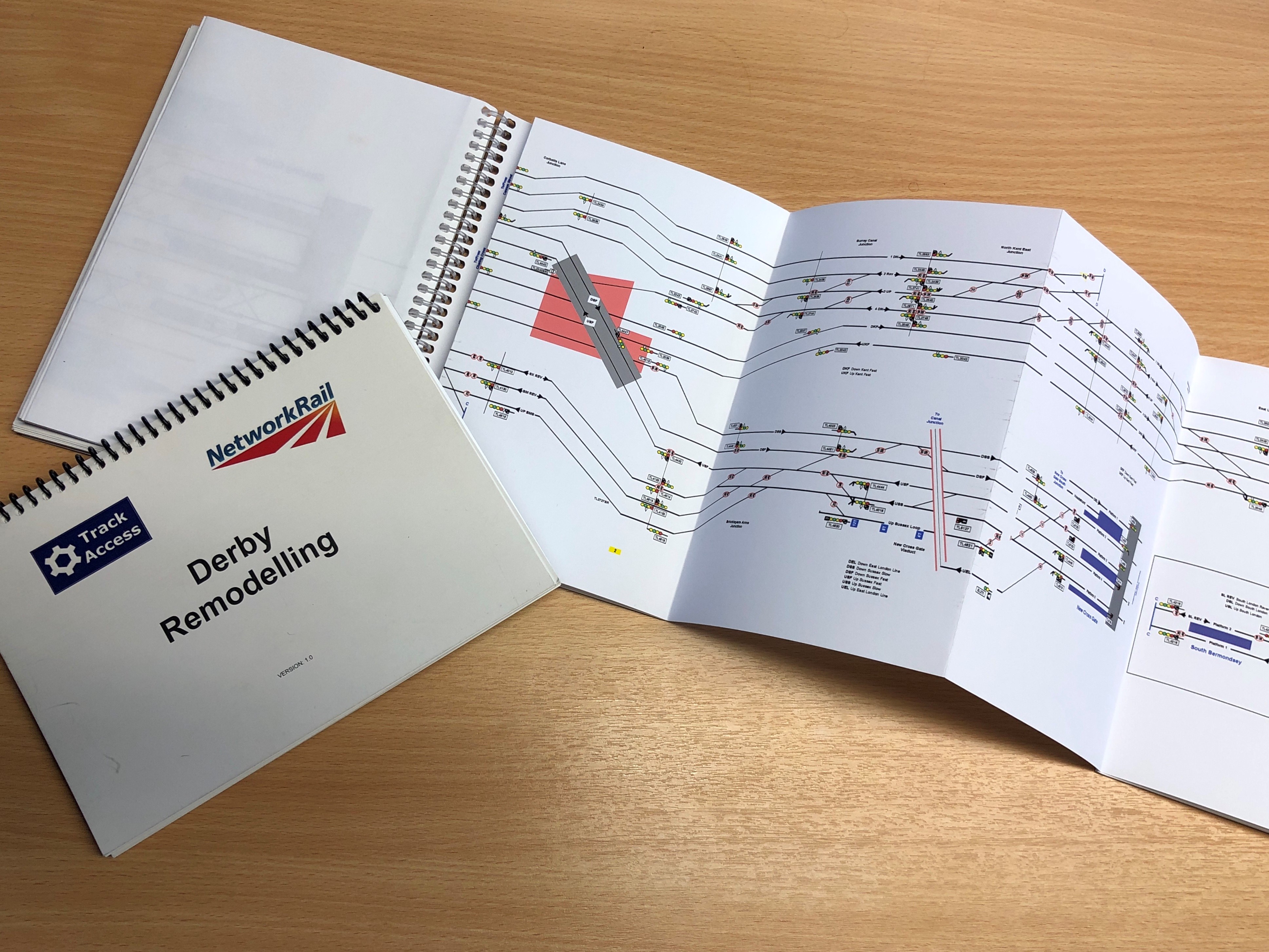 driver training header A set of driver briefings maps printed on white paper laid out on a desk