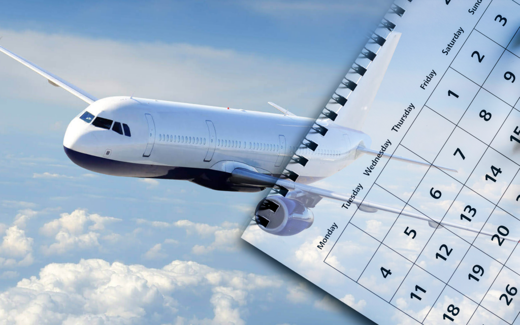 A picture of an aeroplane in the sky, with a calendar on it